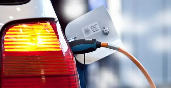 Electric car plugged into EV charger after professional installation in Easton, PA