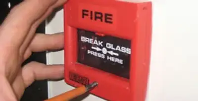fire alarm installation service showing manual fire alarm pull station installed by licensed electricians in Easton, PA