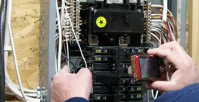 Home electrical inspection of circuit breaker panel by licensed electrician in Easton, PA