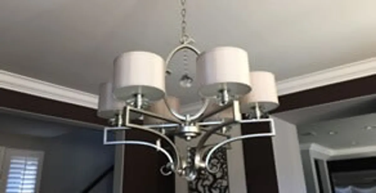 Modern chandelier installation with multiple light fixtures in Easton, PA