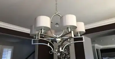 Modern chandelier installation with multiple light fixtures in Easton, PA