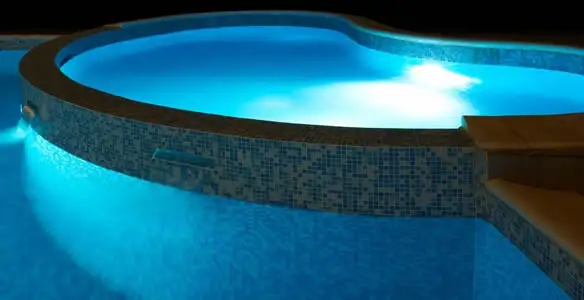 pool light installation and repair services highlighting illuminated pool interior lighting in Easton, PA